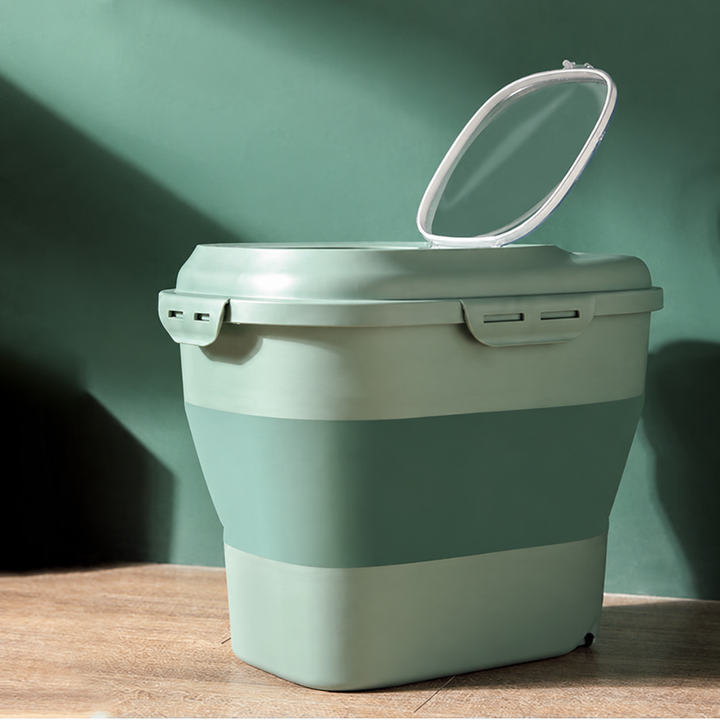 Green collapsible pet food storage bin with open transparent lid